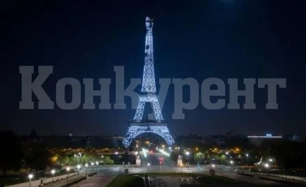 Айфеловата кула заблестя в бяло в почит към медиците