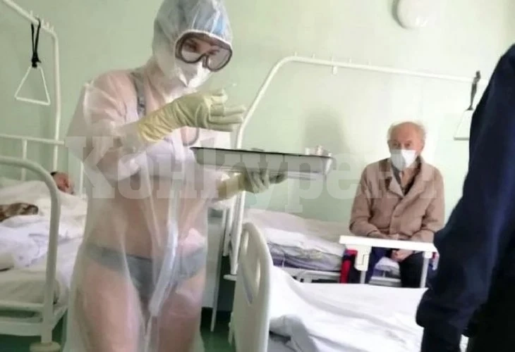 Стана ясно коя е палавата медсестра, бореща К-19 с прозрачен костюм на голо СНИМКИ